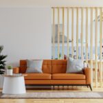 Modern living room with orange sofa