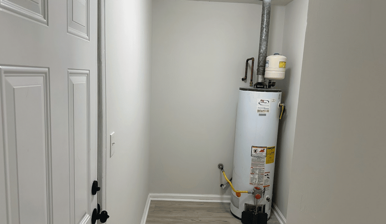 Water heater in small utility closet.