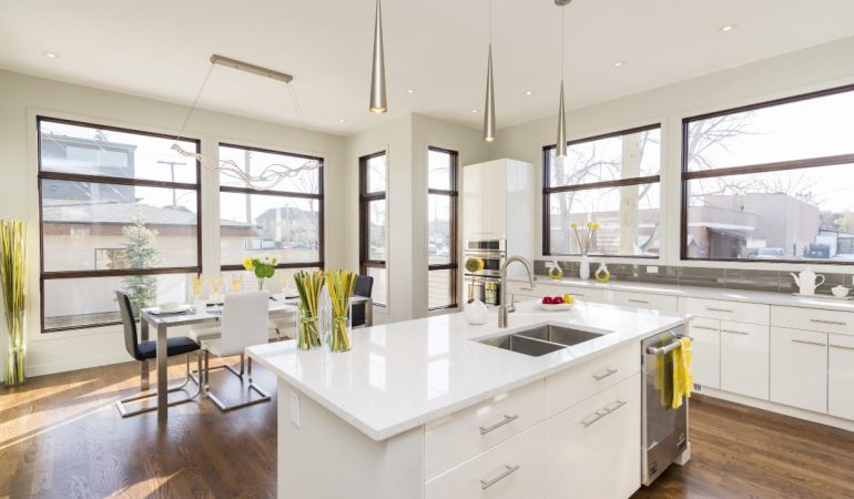 Bright modern kitchen with white island