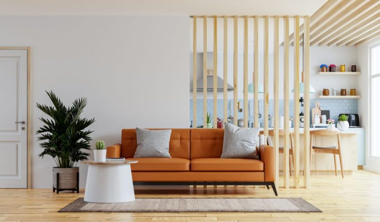 Modern living room with orange sofa